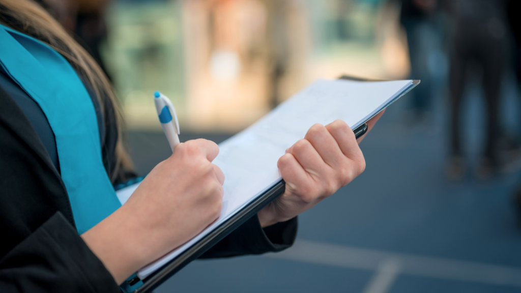 woman holding clipboard and pen for checklist