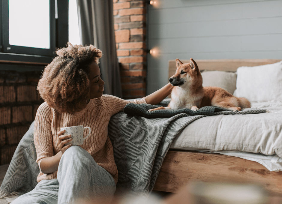 woman petting dog