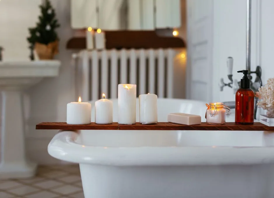 Bathtub and bathroom with candles and holiday decor
